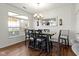 Elegant dining room with modern chandelier and large windows offers a pleasant dining experience at 11339 Fonthill Dr, Indianapolis, IN 46236