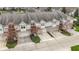 Charming townhomes featuring attached garages, well-kept landscaping, and inviting curb appeal at 11339 Fonthill Dr, Indianapolis, IN 46236