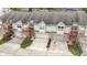 Charming townhomes featuring attached garages, well-kept landscaping, and inviting curb appeal at 11339 Fonthill Dr, Indianapolis, IN 46236