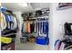 Bright walk-in closet with ample storage, shelving, and space for organizing clothes and accessories at 11339 Fonthill Dr, Indianapolis, IN 46236