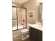 Updated bathroom features decorative stone, a shower with black trim, and new fixtures at 11863 Edgefield Dr, Fishers, IN 46037