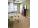 Bedroom featuring carpet floors, floral bedding, and an ornate wooden dresser at 11863 Edgefield Dr, Fishers, IN 46037