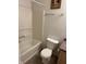 The bathroom is equipped with a tub-shower combination and a classic vanity at 1254 Kenwood Dr, Greenwood, IN 46143