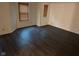 A cozy bedroom is brightly lit by natural light from the windows with wood blinds at 1254 Kenwood Dr, Greenwood, IN 46143