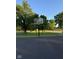 Community basketball court with clear backboard, black pole, and green space at 12722 Brady Ln, Noblesville, IN 46060