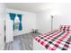 Comfortable bedroom features a large window that brings in natural light at 12722 Brady Ln, Noblesville, IN 46060