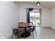 Bright dining area with modern finishes and views of the lake at 12722 Brady Ln, Noblesville, IN 46060