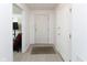 Bright foyer with neutral flooring and white walls, offers a clean and welcoming entrance to the home at 12722 Brady Ln, Noblesville, IN 46060