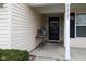 Inviting front porch with decor, enhancing the home's curb appeal and creating a welcoming entrance at 12722 Brady Ln, Noblesville, IN 46060