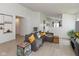 Spacious living room with stylish furnishings, modern decor, and lots of natural light creating a cozy ambiance at 12722 Brady Ln, Noblesville, IN 46060