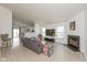 Bright and open living room with modern flooring, fireplace, and neutral decor, creating a welcoming atmosphere at 12722 Brady Ln, Noblesville, IN 46060