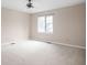 Bedroom featuring a window and neutral walls, ready for customization at 13778 Driftwood Dr, Carmel, IN 46033