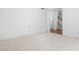 Bright living room with neutral carpet and an open doorway at 13778 Driftwood Dr, Carmel, IN 46033