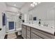 Bathroom with shower, double vanity, and modern fixtures at 1407 Allen Ct, Shelbyville, IN 46176
