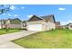 A single Gathering home with an attached two car garage and a large lawn at 1407 Allen Ct, Shelbyville, IN 46176