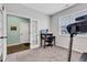 Home office space with desk, chair, and natural light from the window at 1407 Allen Ct, Shelbyville, IN 46176