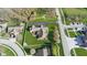 Areal view of a beautiful home with a well-manicured lawn, surrounded by green spaces and a white fence at 1484 N County Road 900 E, Avon, IN 46123
