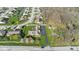 Aerial perspective of a residential property with a lush lawn, well-manicured landscaping, and mature trees at 1484 N County Road 900 E, Avon, IN 46123