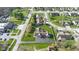 Aerial view of a well-maintained home with a large lot, mature trees, and a private driveway at 1484 N County Road 900 E, Avon, IN 46123