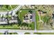 Aerial view showcasing a beautifully landscaped property with a spacious backyard and outdoor deck at 1484 N County Road 900 E, Avon, IN 46123