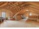 Unfinished attic with wood framing, providing a blank canvas for creating additional living space at 1484 N County Road 900 E, Avon, IN 46123