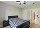 Comfortable bedroom with neutral walls, soft carpet, and ample natural light from the window at 1484 N County Road 900 E, Avon, IN 46123