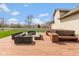 Outdoor deck with modern seating, fire pit, and hot tub, designed for relaxation and entertainment at 1484 N County Road 900 E, Avon, IN 46123