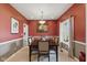 Traditional dining room featuring a wood table, comfortable seating, and warm, inviting decor at 1484 N County Road 900 E, Avon, IN 46123