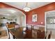 Well-lit dining room showcases a large table and direct access to the office and kitchen at 1484 N County Road 900 E, Avon, IN 46123