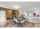Dining area features wood accent wall, modern lighting and an adjacent kitchen area at 1484 N County Road 900 E, Avon, IN 46123