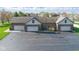 Three-car garage with ample parking space on a paved driveway at 1484 N County Road 900 E, Avon, IN 46123
