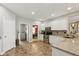 Bright kitchen boasting white cabinetry, stainless steel appliances, and granite counters at 1484 N County Road 900 E, Avon, IN 46123