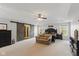 Expansive main bedroom with large bed, sitting area, and barn door leading to en suite at 1484 N County Road 900 E, Avon, IN 46123