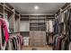 Walk-in closet with custom shelving, hanging racks, drawers and ample storage space at 1484 N County Road 900 E, Avon, IN 46123