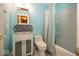 Well lit bathroom with a shower/tub combo, neutral walls, and a large mirror at 1509 Copperwood Pl, Carmel, IN 46033