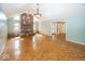 Spacious living room features a brick fireplace, large windows, and hardwood floors at 1509 Copperwood Pl, Carmel, IN 46033