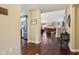Open foyer showcases hardwood floors, connecting the kitchen, living room, and staircase at 15129 Smithfield Dr, Westfield, IN 46074
