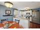 Eat-in kitchen featuring granite countertops, stainless steel appliances, and ample cabinet space at 15129 Smithfield Dr, Westfield, IN 46074