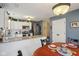 Eat-in kitchen with granite countertops, stainless steel appliances, and white cabinetry at 15129 Smithfield Dr, Westfield, IN 46074
