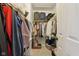 Functional walk-in closet with organized shelving, hanging rods, and ample space for clothing and storage at 15129 Smithfield Dr, Westfield, IN 46074