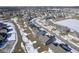 Aerial perspective of neighborhood highlighting the layout, streets and winter landscape at 15365 Todd S Ln, Fishers, IN 46037