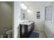 Bathroom with double sink vanity, large mirror, and tiled floors at 15365 Todd S Ln, Fishers, IN 46037