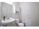 Small bathroom with a pedestal sink and toilet at 15365 Todd S Ln, Fishers, IN 46037