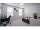 Bright bedroom features natural light from two windows and desk with computer at 15365 Todd S Ln, Fishers, IN 46037