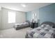 Comfortable bedroom featuring twin beds, soft color palette, and carpeted floors at 15365 Todd S Ln, Fishers, IN 46037