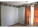 Bright bedroom with neutral walls, carpet and a window at 1631 Wilford Ln, Indianapolis, IN 46229