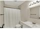 Bathroom with vanity, white shower curtain, and new lighting at 1632 Queensbridge Sq # 7, Indianapolis, IN 46219