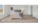 Serene bedroom featuring a cozy bed, neutral tones, and a window for natural light, creating a peaceful retreat at 1632 Queensbridge Sq # 7, Indianapolis, IN 46219
