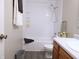 The updated bathroom features a shower-tub combo and decorative fixtures at 1643 Kayla Dr, Indianapolis, IN 46234