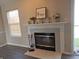Cozy fireplace featuring decor on the mantel and wood-look floors at 1643 Kayla Dr, Indianapolis, IN 46234